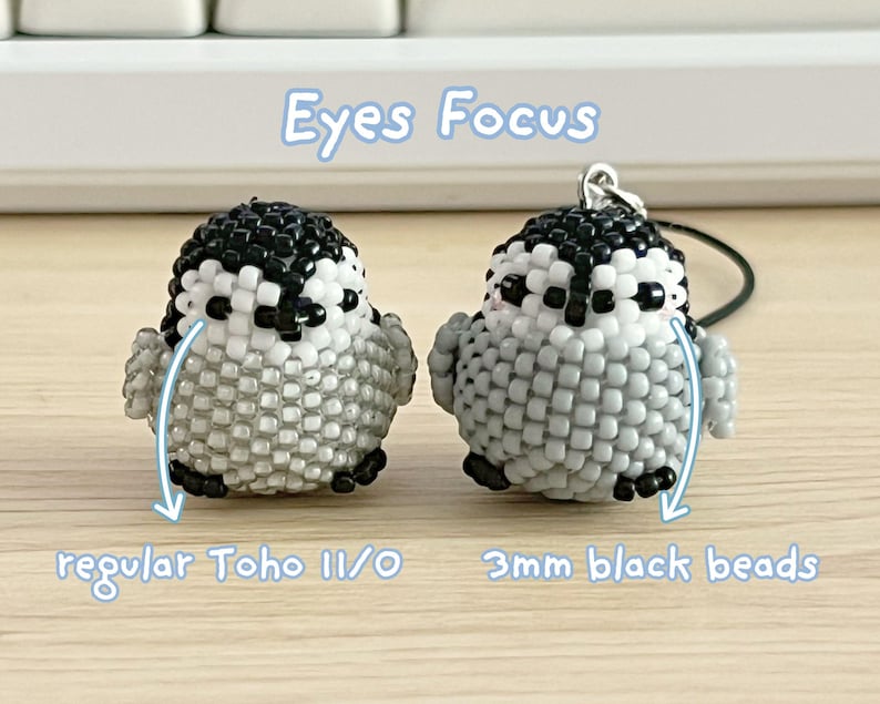 May include: Two small bird figurines crafted from beads, featuring black, white, and grey patterns. The text "Eyes Focus" appears above, with arrows pointing to "regular Toho 11/0" and "3mm black beads" labels indicating the specific bead types used.