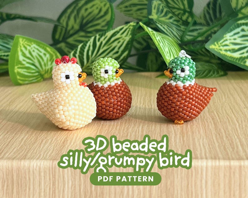 May include: Three small 3D bird figurines crafted from tiny beads. The left bird is cream-colored with a red crest. The middle and right birds have green heads and brown bodies. Text on the image reads: 3D beaded silly/grumpy bird PDF PATTERN.