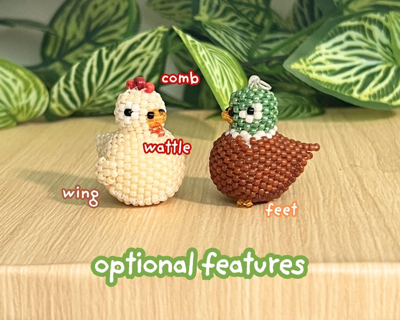 May include: Two small beaded figurines, a cream-colored chicken and a brown and green mallard duck, are displayed with text labels pointing to specific parts including comb, wattle, wing, and feet, with the text optional features below.