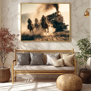 May include: A framed print depicts a dramatic scene of cowboys on horseback racing alongside a speeding steam train. The sepia-toned artwork captures the energy of the chase, with dust and smoke adding to the dynamic composition. The print is displayed above a gold bench with pillows.
