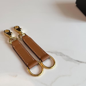 Piel Epsom hecha a mano con anillas para pañuelos para bolsos
