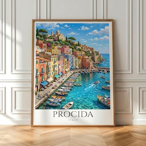 May include: A framed art print of Procida, Italy, featuring a colorful coastal town with buildings in shades of yellow, pink, and orange. The artwork depicts boats in a turquoise harbor, a bridge, and a church on a hill under a blue sky.