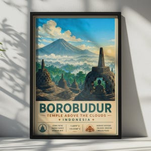 Puede incluir: Un póster de viaje enmarcado de Borobudur, Indonesia, con un paisaje montañoso, estupas de piedra y una estatua de Buda sentado. El texto dice: BOROBUDUR TEMPLE ABOVE THE CLOUDS INDONESIA, con las coordenadas 7.6079 S 110.2038 E e iconos descriptivos.