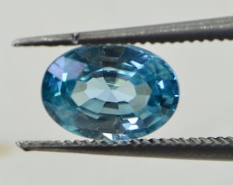 Aqua Blue Topaz: Oval Faceted Cabochon, November Birthstone