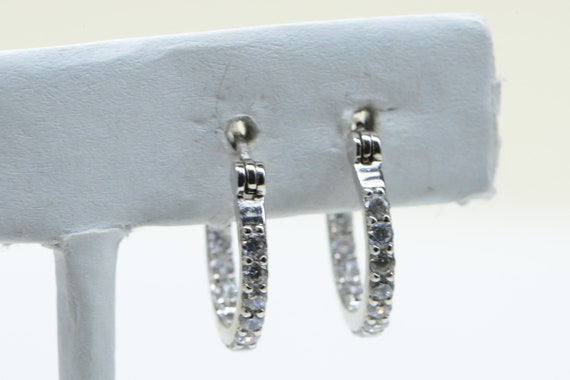 Puffed Hoop Earrings with Sparkling Line of Cubic Zirconia Stones Sterling Silver Puffed Hoop Earrings with Sparkling Line of Cubic Zirconia Stones Sterling Silver