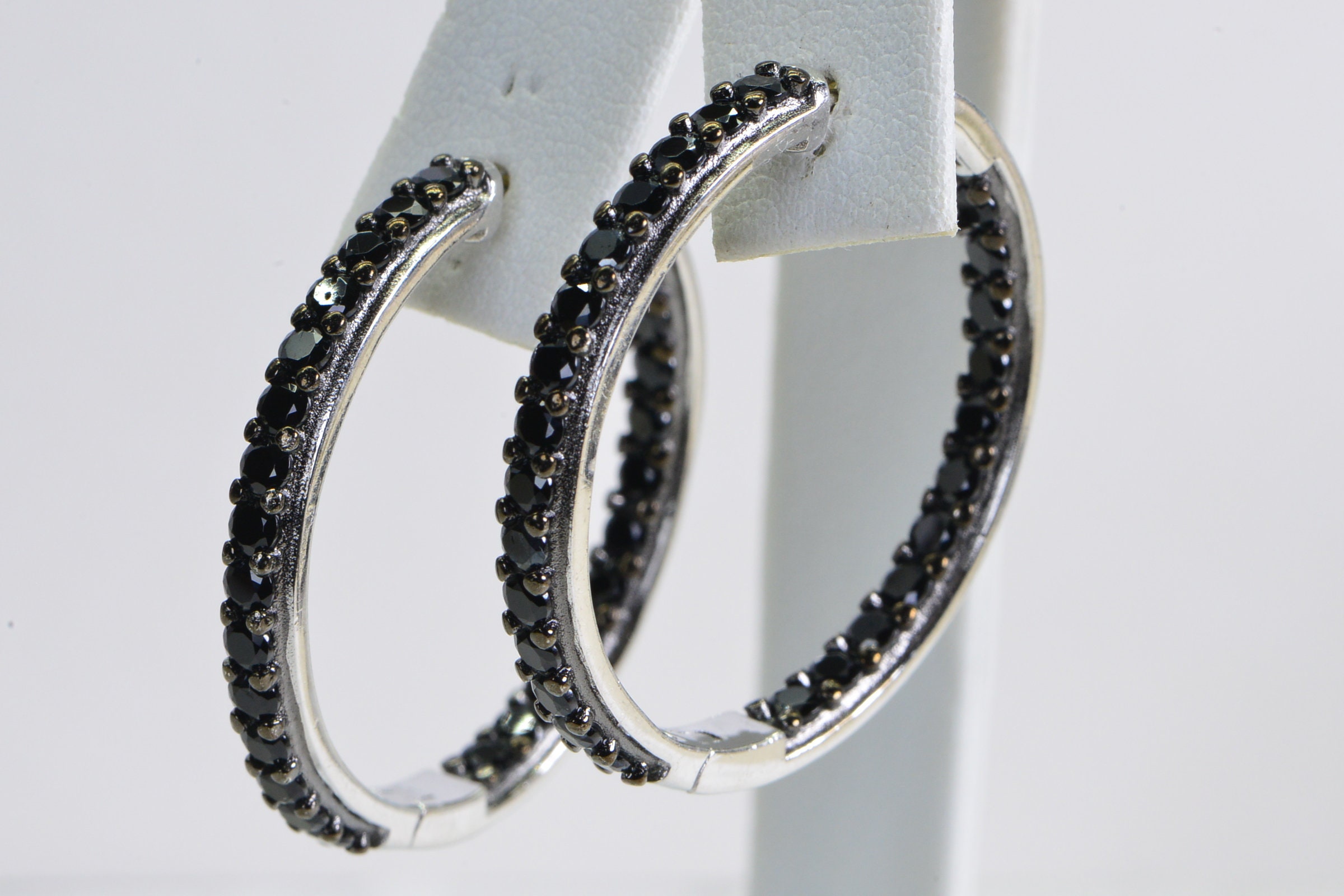 Large black diamond hoop earrings discount