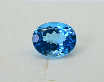 AAA Blue Topaz: Oval Faceted November Birthstone (8X10X5.2mm)