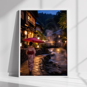 May include: A framed vertical wall art print depicting a person in a light pink patterned kimono walking along a stone path beside a flowing stream at dusk. A bright pink umbrella is held overhead, with wooden buildings and a bridge in the background.