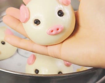 Gestoomde Piggy Buns: met pluizige vla gevulde toetjes