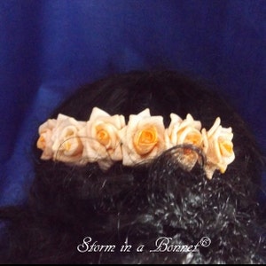 Peach foam flowered hair comb