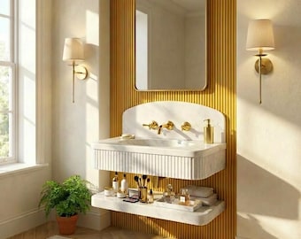 May include: A contemporary bathroom vanity featuring a marble sink, gold taps, and a rectangular mirror. The vanity includes two shelves displaying beauty products and a small potted plant. The wall behind the vanity is yellow with vertical wooden panelling.
