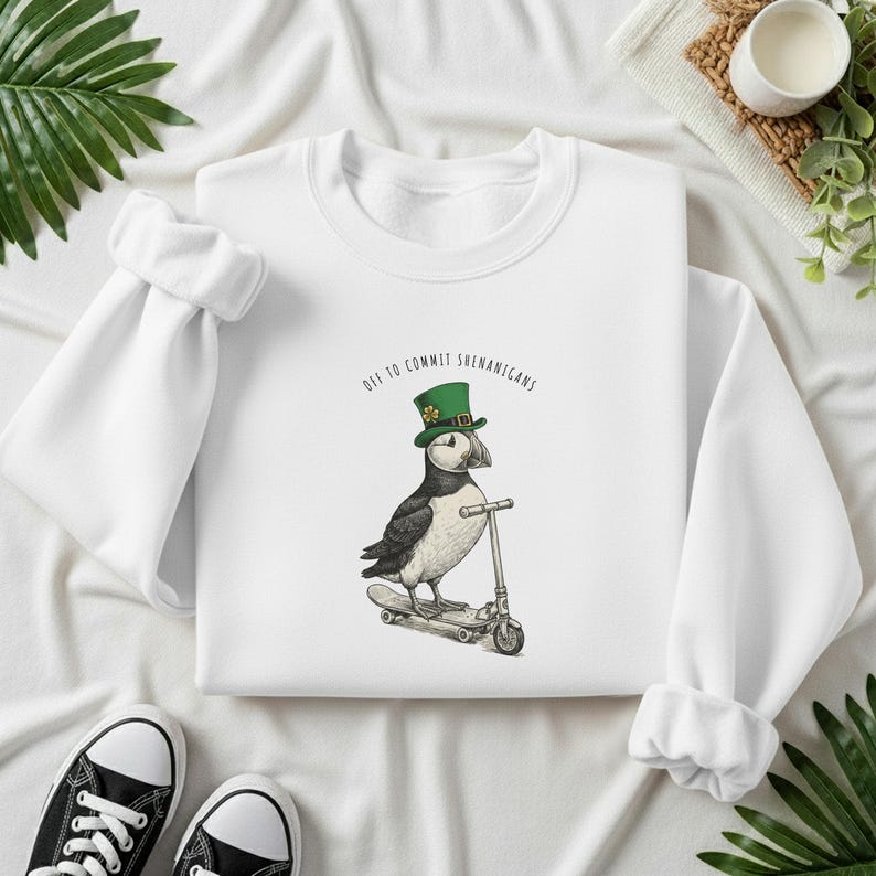 May include: A set of three ceramic mugs with a speckled, matte finish. The mugs are in shades of cream, light grey, and dark grey. Each mug has a simple, minimalist design, ideal for coffee or tea.