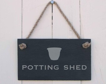 Hanging sign 'potting shed'
