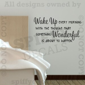May include: A wall decal with the text "Wake Up every morning with the thought that something Wonderful is about to happen."