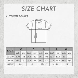 May include: A size chart for youth t-shirts, with measurements in inches and centimeters. The chart includes shirt length and width measurements for sizes XS to XL, and US sizes 4-5 to 18. The text "SIZE CHART" is at the top.