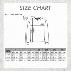 May include: A size chart for long sleeve shirts, with measurements in inches and centimetres. The chart includes sizes S through 4XL, detailing length, width, and sleeve measurements. The text "SIZE CHART" is at the top.