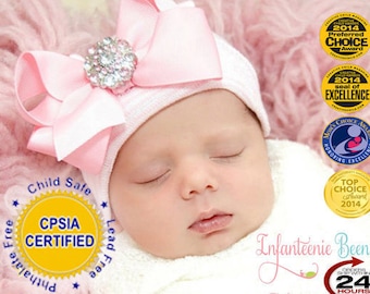 pink baby hat with bow
