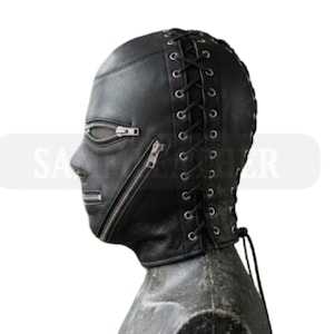 May include: Black leather hood with a zippered mouth and eye openings. The hood features a lace-up back and is designed to cover the entire head and neck. The mask is shown in profile against a white background.