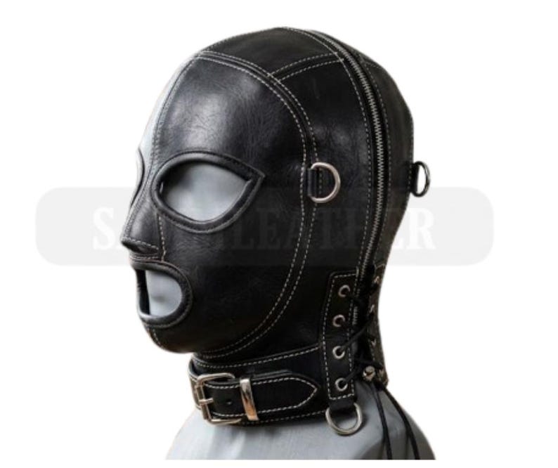 May include: Black leather hood with eye and mouth openings, white stitching, and a zip closure. Features a buckled neck strap and metal rings. The hood is designed for a specific purpose.