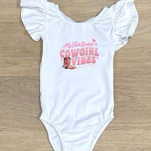 My first Rodeo - Cowgirl Vibes Girl&#39;s White Flutter Sleeve Leotard - Baby Leotard - Birthday Leotard - Cute and Comfy leotard - Baby graphic