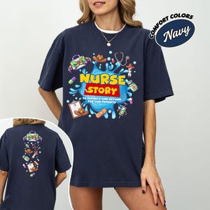 May include: Navy blue t-shirt with a graphic that says "Nurse Story" in yellow and red, surrounded by medical-themed illustrations. The shirt also has the text "To infinity and beyond for our patients."