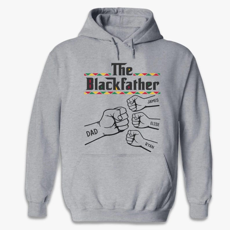 May include: A light gray hoodie with the text "The Blackfather" above a graphic of four fists bumping. The names "James", "Elise", and "Ryan" are printed above three of the fists, and "DAD" is printed above the fourth.
