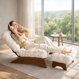 May include: A beige corduroy lounge chair and ottoman set with a wooden base. The chair is reclined, and the ottoman is positioned in front. The set is on a light-colored rug near a large window.