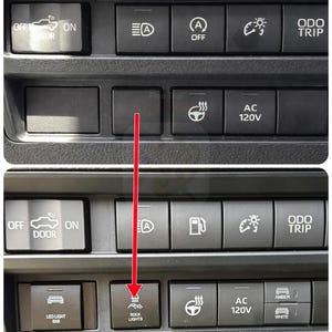 May include: Close-up of a vehicle's dashboard with various illuminated buttons. The buttons include controls for door, mirror, and lights, including "ROCK LIGHTS" and "LED LIGHT BAR". The dashboard is black.