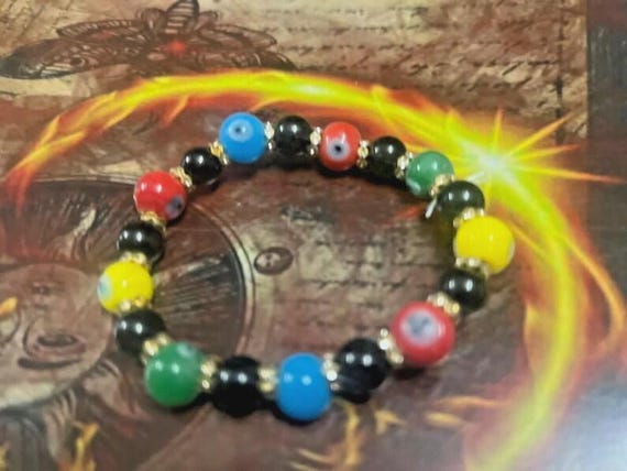 Attracting Magick Bracelet 77700 SpeIIs Wealth .