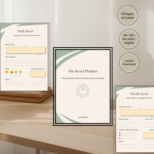 Könnte beinhalten: Ein digitaler Planer mit dem Titel The Reset Planner 2026 Edition mit einem Power-Button-Symbol, der Daily Reset- und Weekly Reset-Seiten enthält. Das Layout umfasst Bereiche für Fokus, Prioritäten, Stimmung, Selbstfürsorge, Ziele und Dankbarkeit.