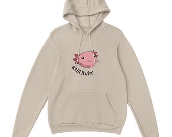 Sudadera con capucha Still Livin’: sudadera seca y existencial de ajolote, estilo introvertido, ropa urbana minimalista.