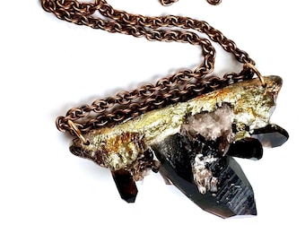 Black Irradiated Quartz Pendant Necklace – Raw Crystal in Gold Resin on Copper Chain – Wearable Art by Pauletta Brooks