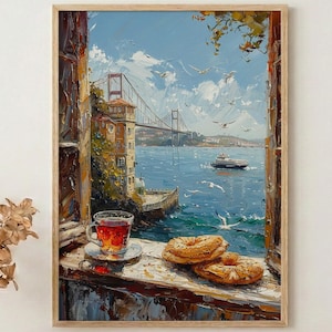 May include: Oil painting print of a scenic view through a window. The artwork depicts a bridge over a body of water, with a teacup and pastries on the windowsill. The color palette includes blues, browns, and whites, creating a serene atmosphere.