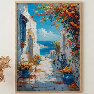 May include: A framed painting depicts a sunlit alleyway leading to the sea. White buildings with blue accents line the path, adorned with orange flowers and blue pots. A blue bicycle rests against a wall, and the sky is a vibrant blue.
