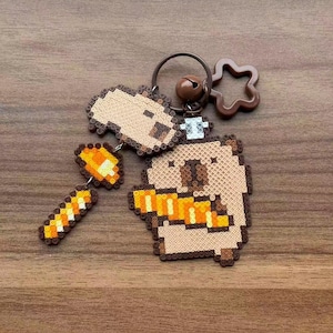 Handmade perler bead capybara charm, pixel art keychain, kawaii animal keyring