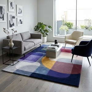 May include: A trio of ceramic mugs with a speckled, matte finish in cream, light brown, and dark brown. Each mug features a simple, minimalist design, ideal for tea or coffee.