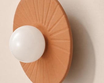 Handmade Sunburst Terracotta Wall Sconce | Radiant Ceramic Disc Wall Lamp