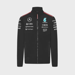 May include: Black zip-up jacket with multiple logos and text. The jacket features a high collar, a full-length zipper, and red and white stripes on the shoulders. Logos include "PETRONAS", "INEOS", "UBS", and "TeamViewer".