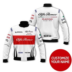 May include: White Alfa Romeo Racing jacket with red and black accents. The jacket features the Alfa Romeo Racing logo, sponsor logos, and the text "SINCE 1910." The jacket has a black collar and cuffs, and a zipper closure. The words "CUSTOMIZE YOUR NAME" are on a red circle.