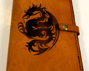 Handmade Engraved Dragon Leather A5 Journal Cover Comes with 1 A5 lined journal installed Two pen loops and two card holder pockets.