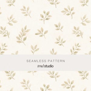 May include: A seamless pattern featuring small, light green watercolour-style leaf sprigs scattered across a cream-coloured background. A horizontal white banner across the centre displays the text SEAMLESS PATTERN and trnd studio in black.