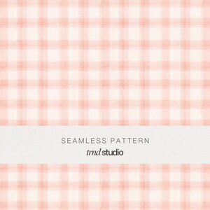 May include: A seamless pattern featuring a soft peach and white watercolor gingham check design. A horizontal white band across the center displays the text SEAMLESS PATTERN and trnd studio in a clean, dark gray sans-serif typeface.