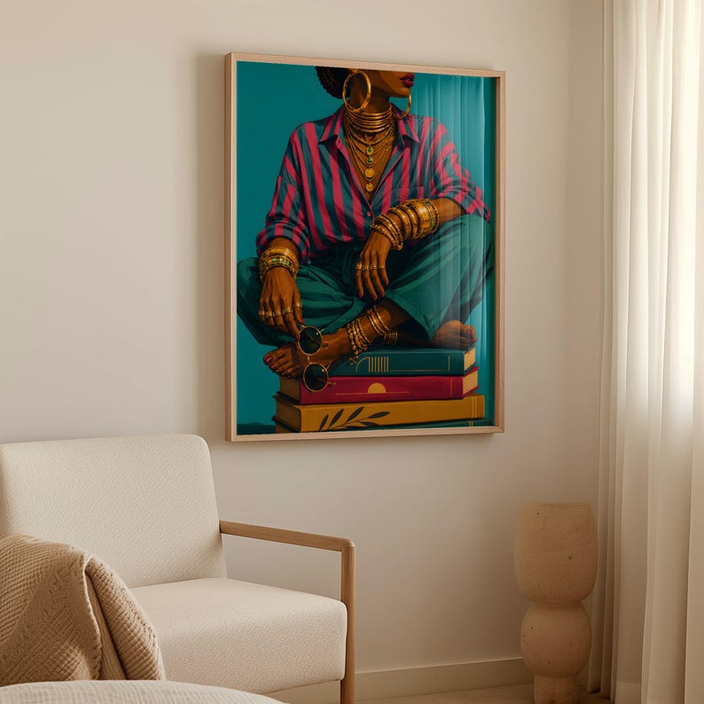 May include: A framed wall art print depicting a person wearing a pink and blue striped button-down shirt and teal trousers, adorned with multiple gold necklaces, bracelets, and rings, sitting on a stack of three books while holding round sunglasses.