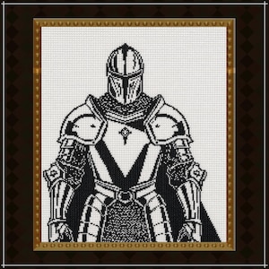 Op de afbeelding: Zwart-wit kruissteek van een ridder in volledige wapenrusting, geplaatst in een goudkleurige lijst. De helm en het harnas van de ridder zijn gedetailleerd met ingewikkelde patronen. De achtergrond is een wit raster, en de lijst heeft een decoratieve rand.
