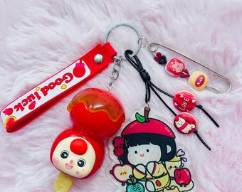 Adorable Keychain/Bag Charm With Red Figures From Babythree