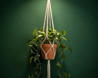Anello portavaso in macramè, semplice vaso sospeso in corda di cotone, decorazione d'interni minimalista in stile boho.