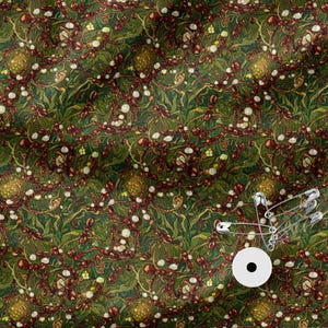 May include: A fabric featuring a dense, repeating pattern of reddish-brown ants, green foliage, and small white circular elements. A silver metal safety pin is attached to the lower right corner of the textile, resting near a white circular tag.