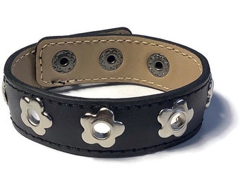 Flower Eyelet Black Leather Cuff Bracelet: Adjustable Studded Design