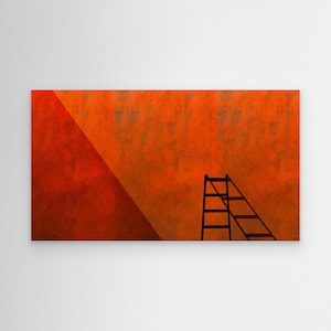 May include: Abstract art print showing a black ladder casting a shadow on a textured orange wall. A red triangle shape is on the left side of the wall. The artwork has a minimalist aesthetic.