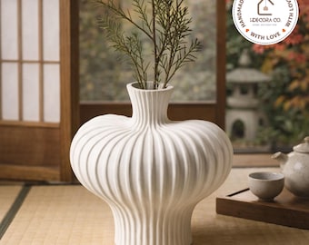 Vaso de plástico moderno e minimalista em estilo cerâmica, decoração de mesa nórdica, acessório para casa com aparência artesanal.
